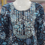 Floral and embroidered patterned top on a mannequin