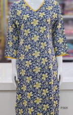 Blue dress with yellow floral pattern on a mannequin