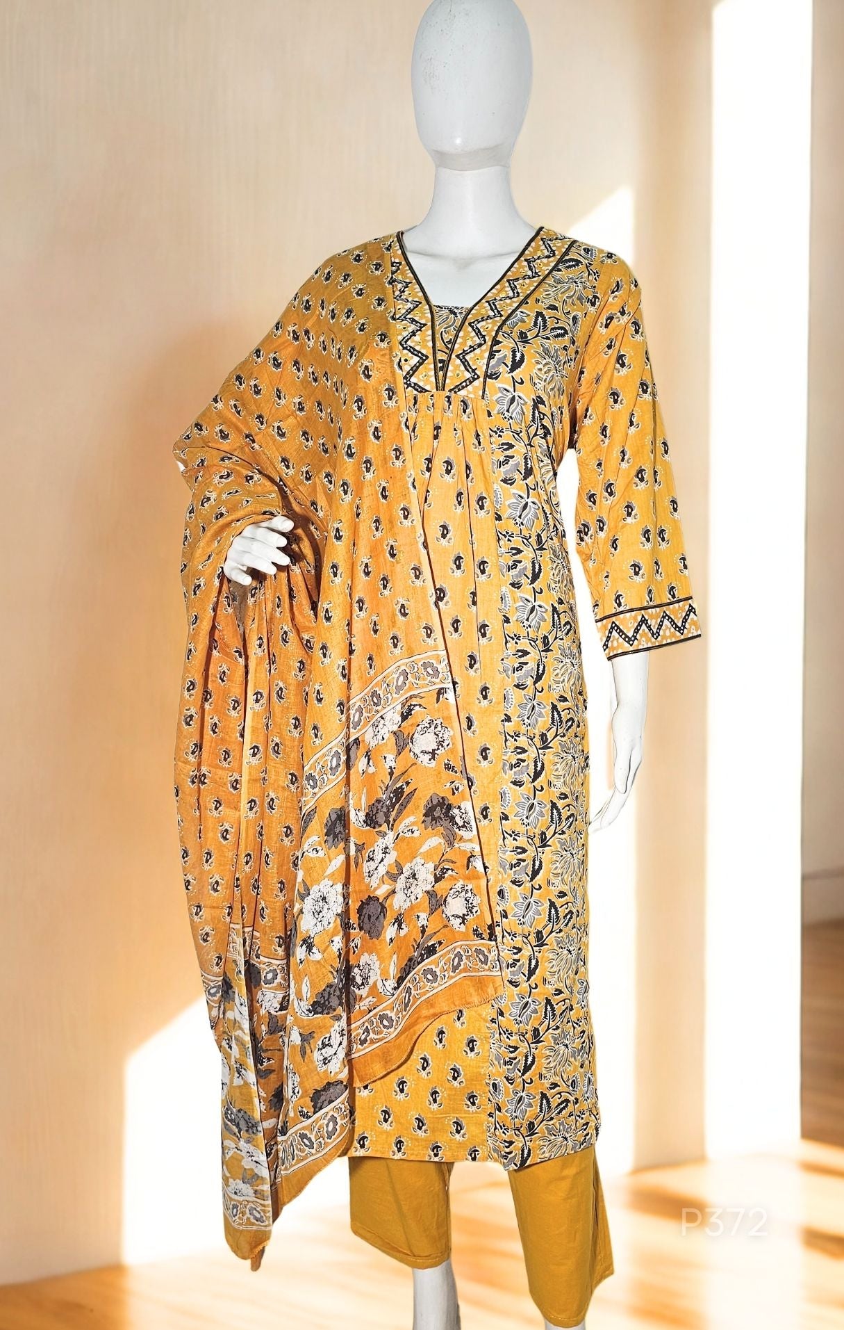 A 3-piece cotton kurta set in rich yellow