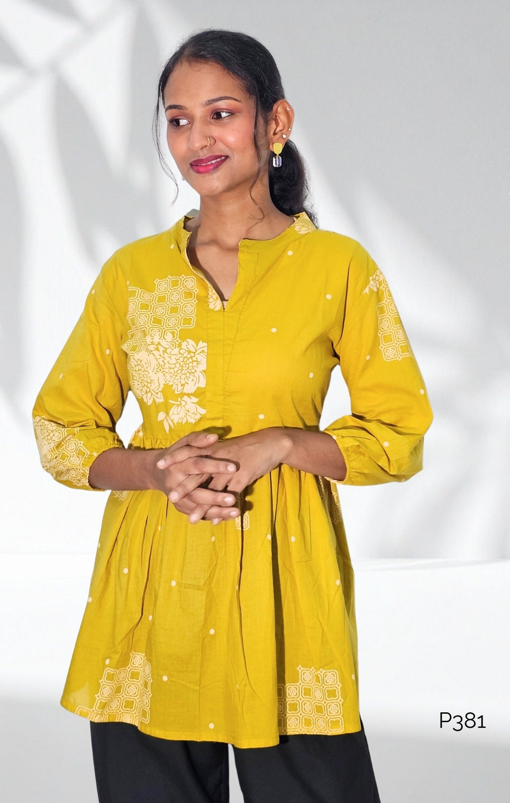 Mustard Cotton Printed Peplum Short Kurti with Floral Motifs
