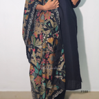 Navy blue floral patterned garment on a plain background