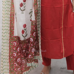 Red traditional outfit with floral patterns on a plain background