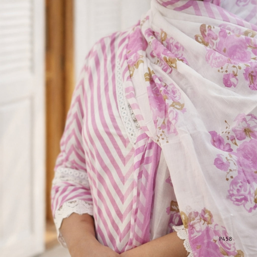 Person wearing a floral scarf with pink and white patterns