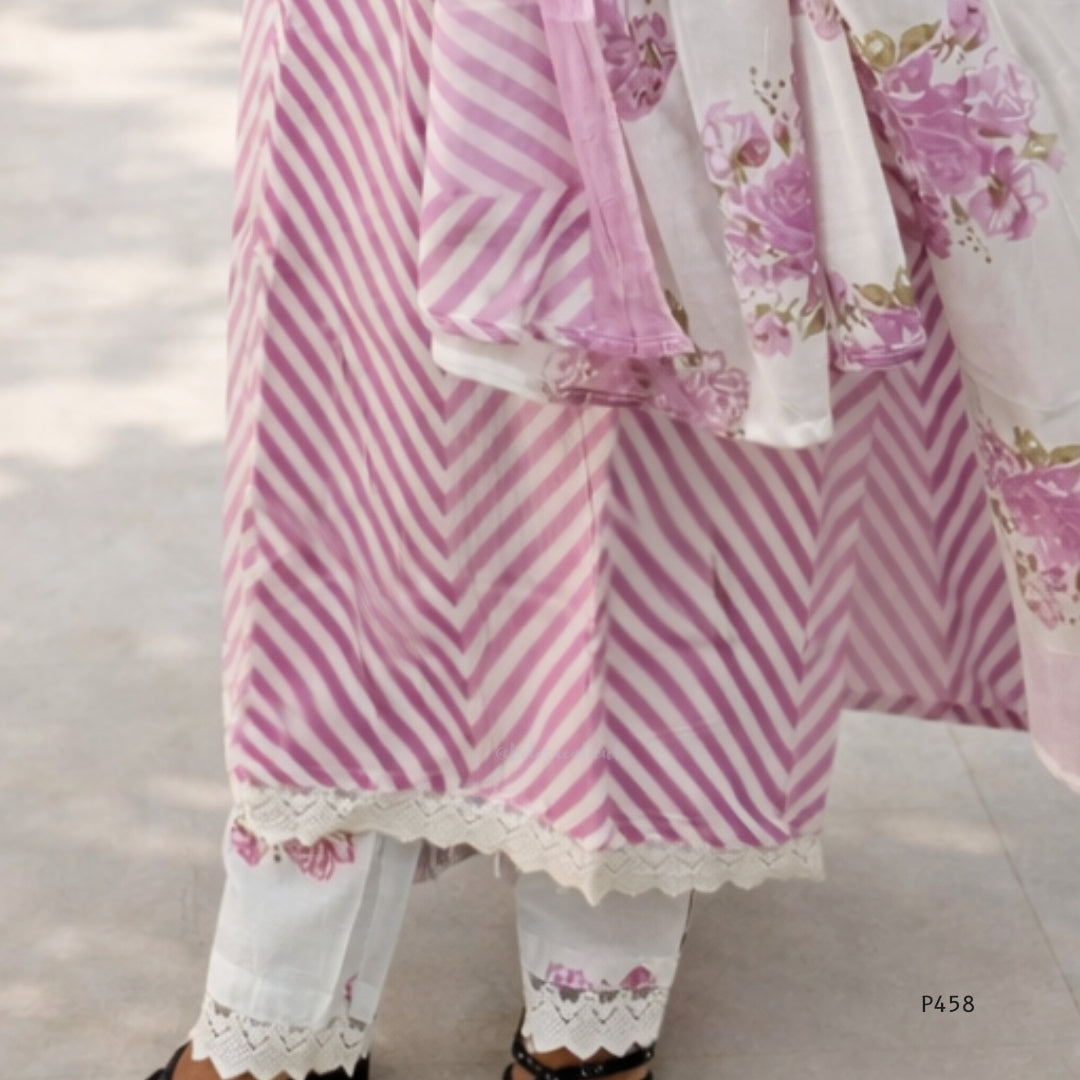 Pink and white striped garment with floral patterns on a neutral background