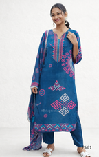 Woman wearing a blue embroidered traditional outfit on a white background