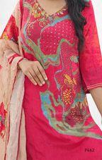 Woman wearing a red embroidered dress with a matching dupatta on a white background
