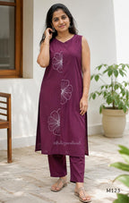 Plum purple Vertigan silk coord set with white floral embroidery and straight pants.