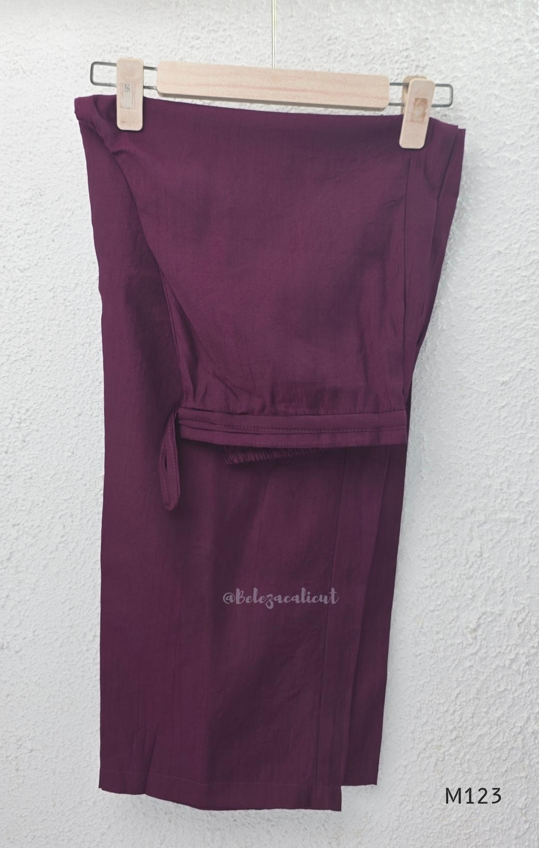 Plum purple Vertigan silk coord set with white floral embroidery and straight pants.
