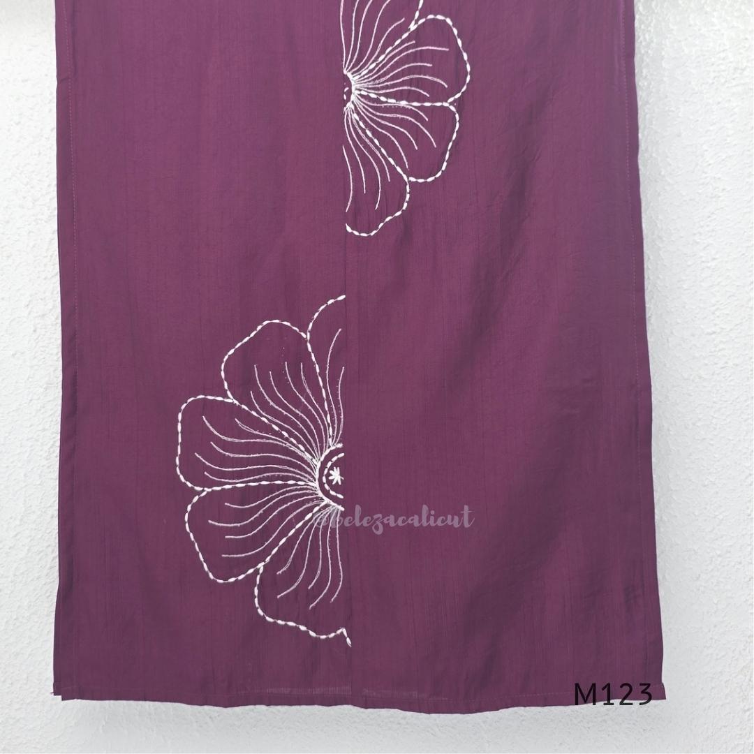 Plum purple Vertigan silk coord set with white floral embroidery and straight pants.