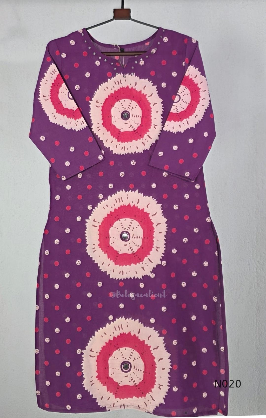 Purple cotton churidar set with pink and cream circular print, real mirror details and matching printed dupatta.