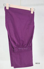 Purple cotton churidar set with pink and cream circular print, real mirror details and matching printed dupatta.