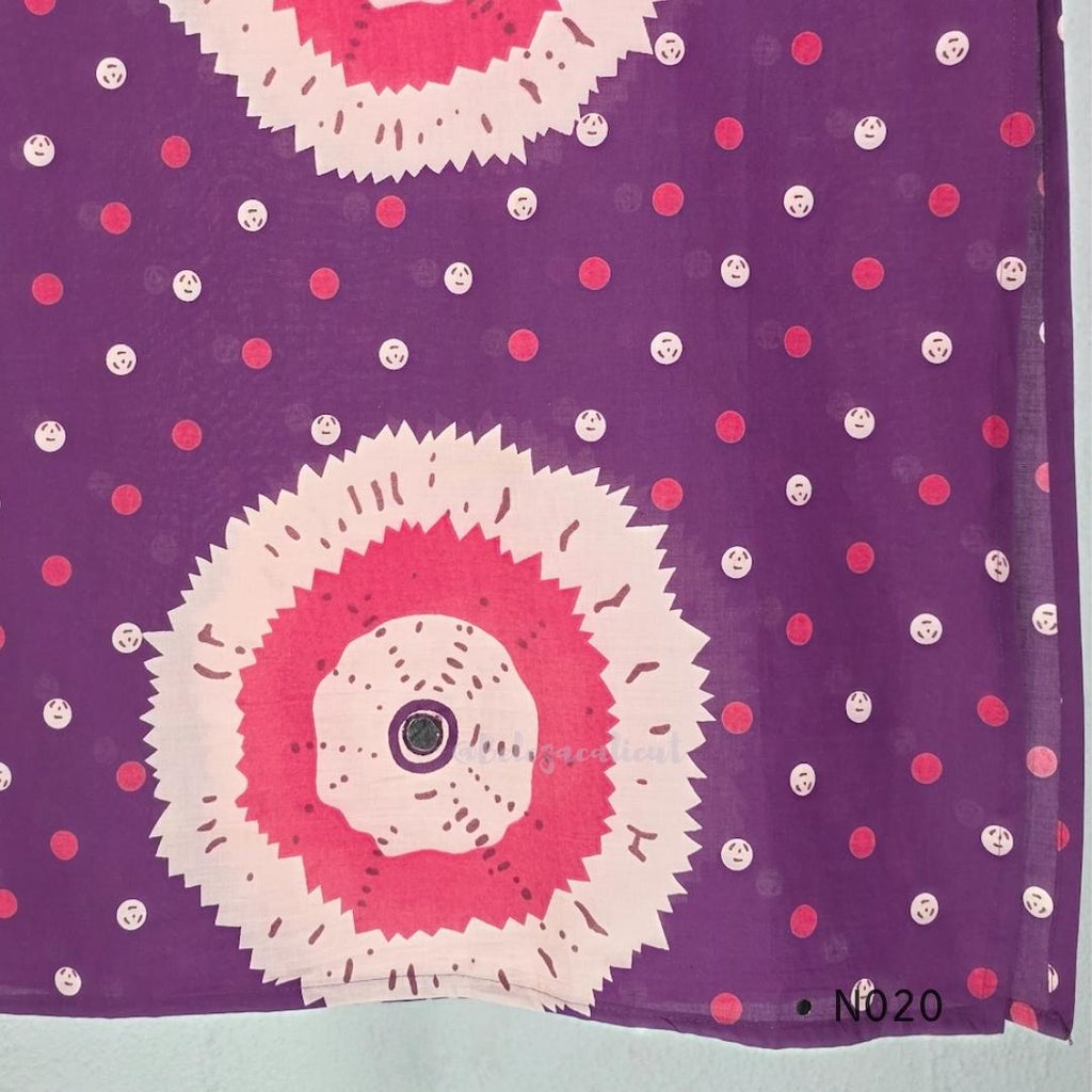 Purple cotton churidar set with pink and cream circular print, real mirror details and matching printed dupatta.