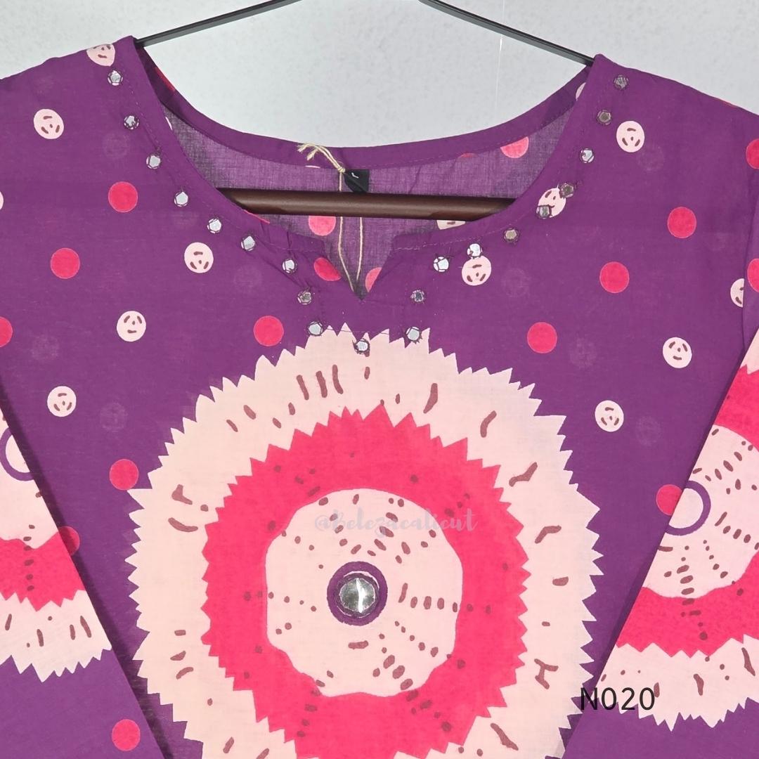 Purple cotton churidar set with pink and cream circular print, real mirror details and matching printed dupatta.