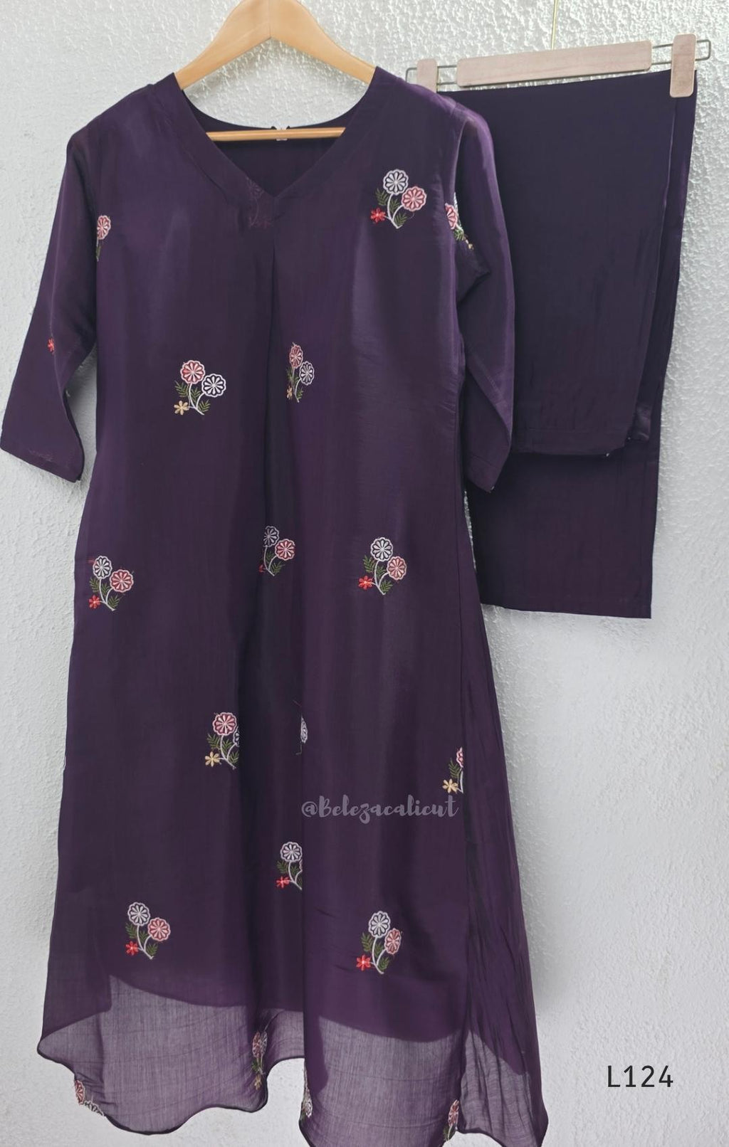Deep purple Mul Chanderi top and bottom coord set with scattered multicolour floral embroidery.