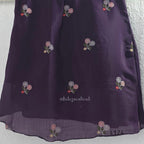 Deep purple Mul Chanderi top and bottom coord set with scattered multicolour floral embroidery.