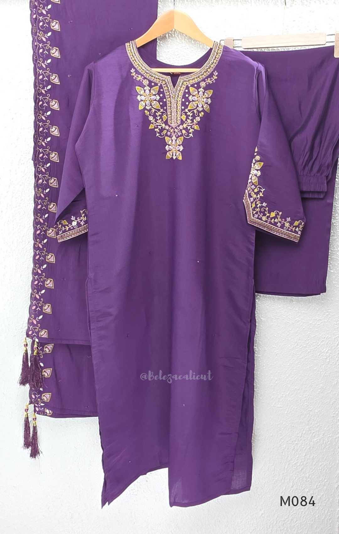 Purple premium Roman silk plus size churidar set with embroidered neckline, sleeve detail, back work, matching bottom and dupatta.