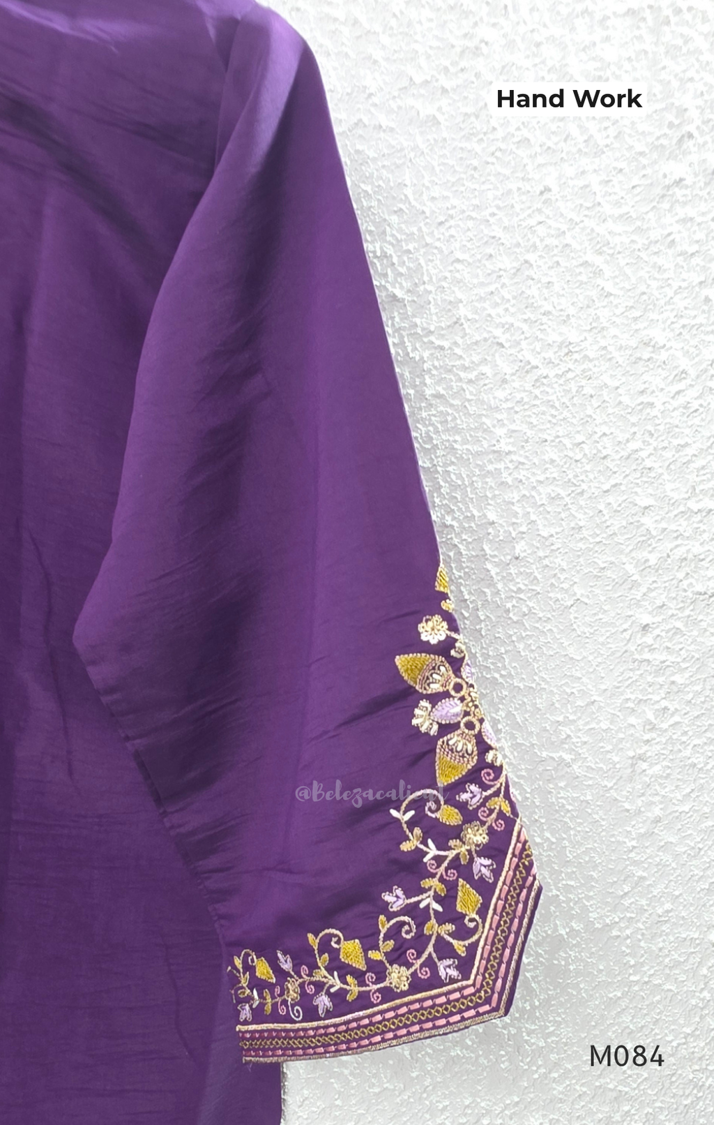 Purple premium Roman silk plus size churidar set with embroidered neckline, sleeve detail, back work, matching bottom and dupatta.