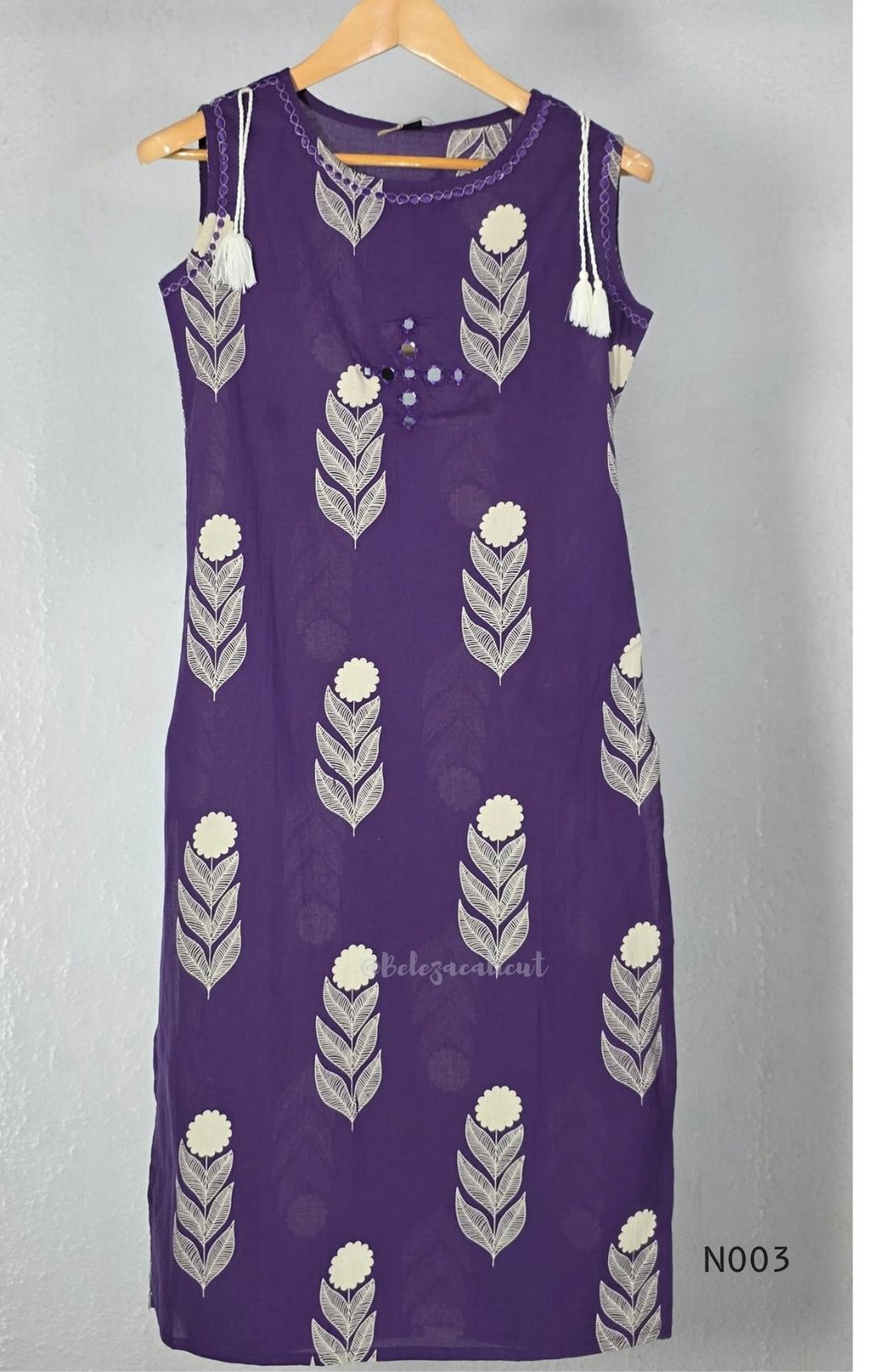 Deep purple cotton top and bottom set with cream floral-leaf print, mirror-style front detail and printed wide-fit pants from Beleza, Mankavu, Calicut.