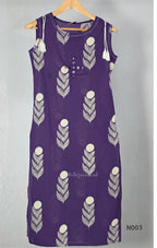 Deep purple cotton top and bottom set with cream floral-leaf print, mirror-style front detail and printed wide-fit pants from Beleza, Mankavu, Calicut.