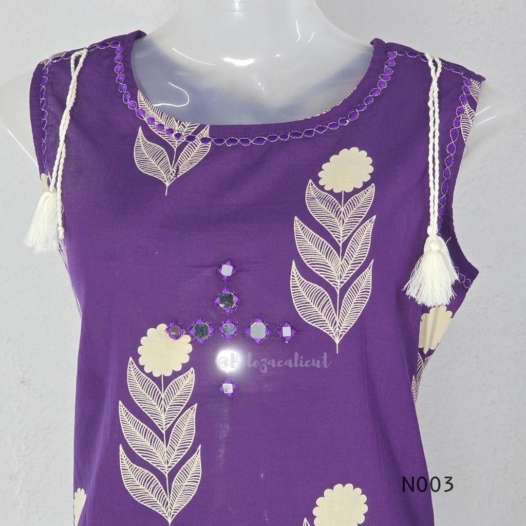 Deep purple cotton top and bottom set with cream floral-leaf print, mirror-style front detail and printed wide-fit pants from Beleza, Mankavu, Calicut.