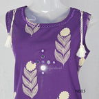 Deep purple cotton top and bottom set with cream floral-leaf print, mirror-style front detail and printed wide-fit pants from Beleza, Mankavu, Calicut.