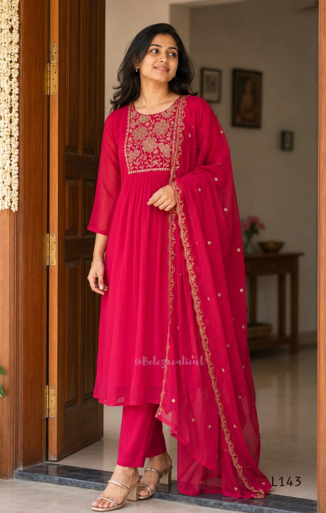 Rani pink georgette 3-piece anarkali-style ethnic set with embroidered floral yoke, matching pant and embellished dupatta.
