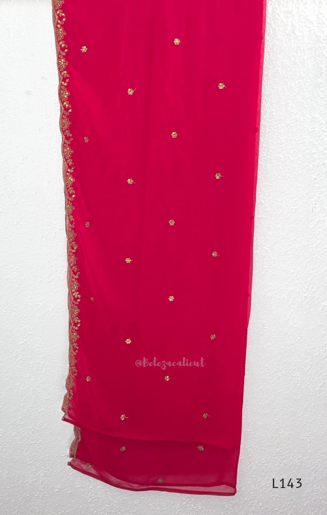 Rani pink georgette 3-piece anarkali-style ethnic set with embroidered floral yoke, matching pant and embellished dupatta.