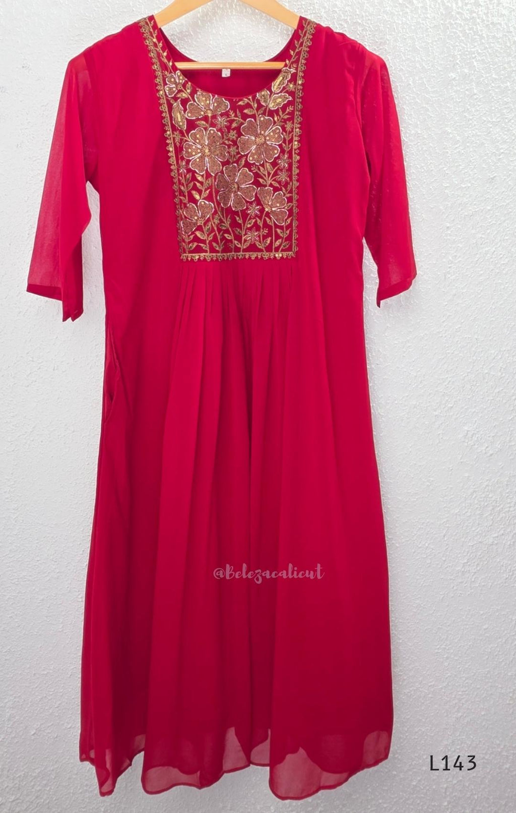 Rani pink georgette 3-piece anarkali-style ethnic set with embroidered floral yoke, matching pant and embellished dupatta.