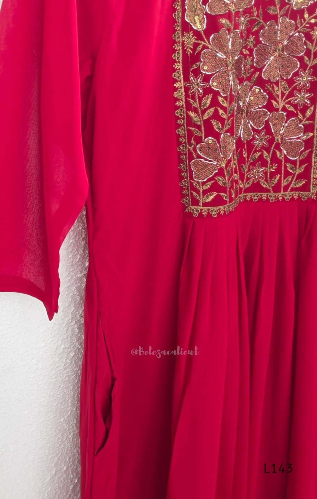 Rani pink georgette 3-piece anarkali-style ethnic set with embroidered floral yoke, matching pant and embellished dupatta.