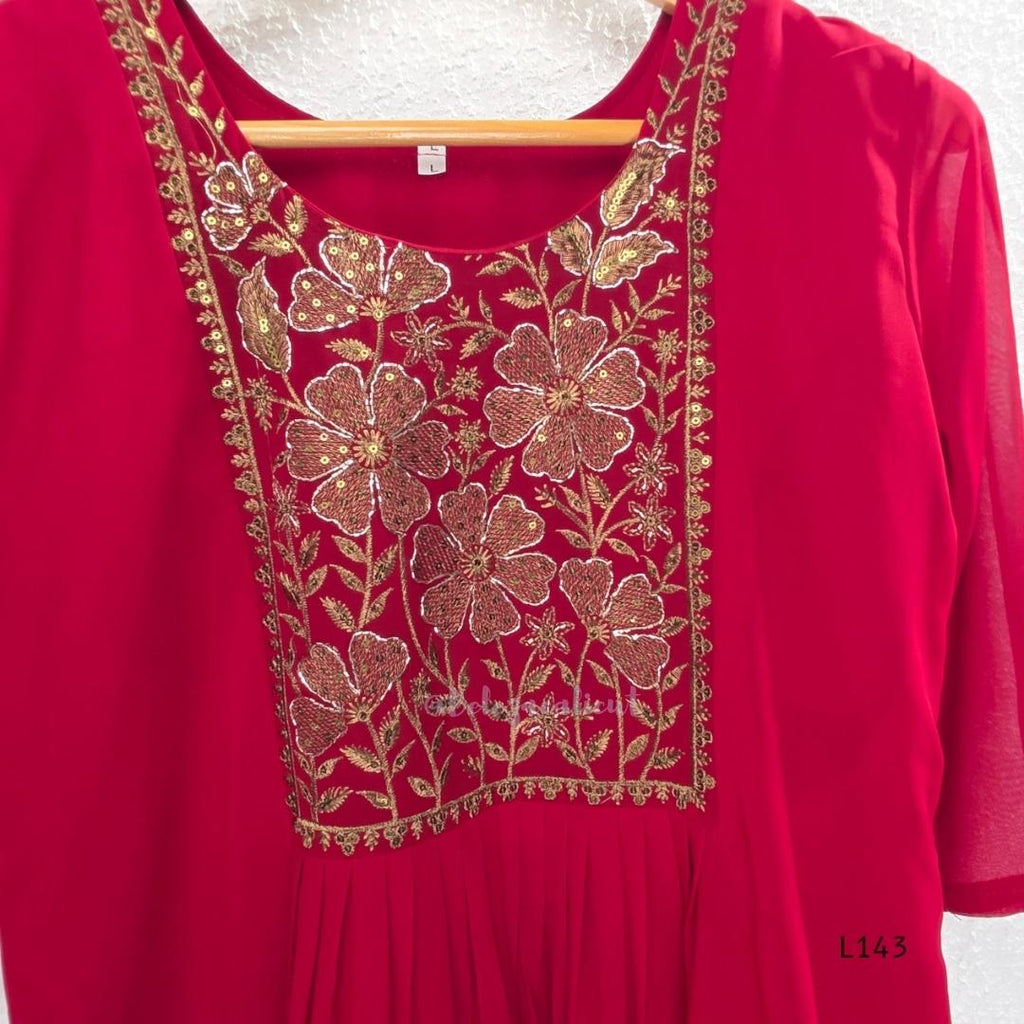 Rani pink georgette 3-piece anarkali-style ethnic set with embroidered floral yoke, matching pant and embellished dupatta.