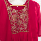Rani pink georgette 3-piece anarkali-style ethnic set with embroidered floral yoke, matching pant and embellished dupatta.