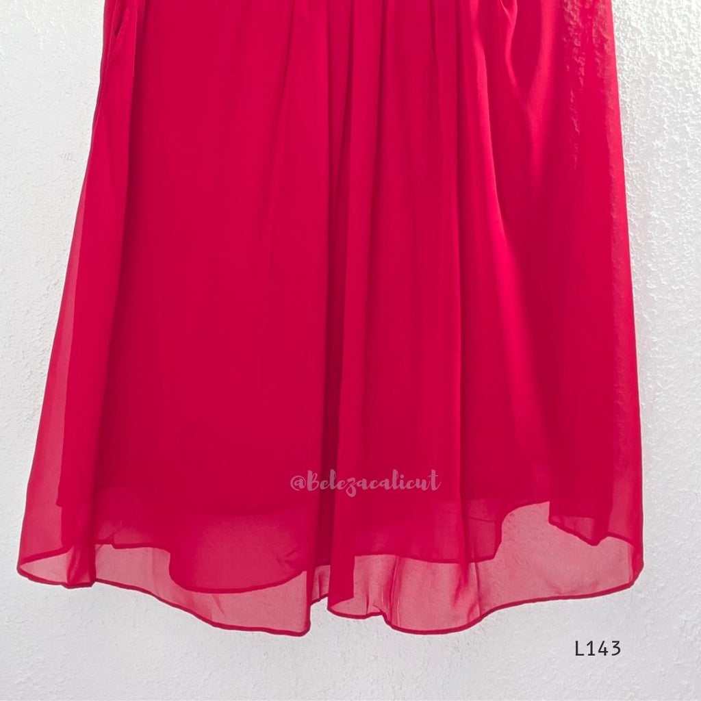 Rani pink georgette 3-piece anarkali-style ethnic set with embroidered floral yoke, matching pant and embellished dupatta.