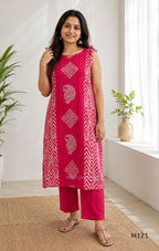Rani pink Vertigan silk two-piece co-ord set with beige central motifs, chevron side panels and matching straight pants.
