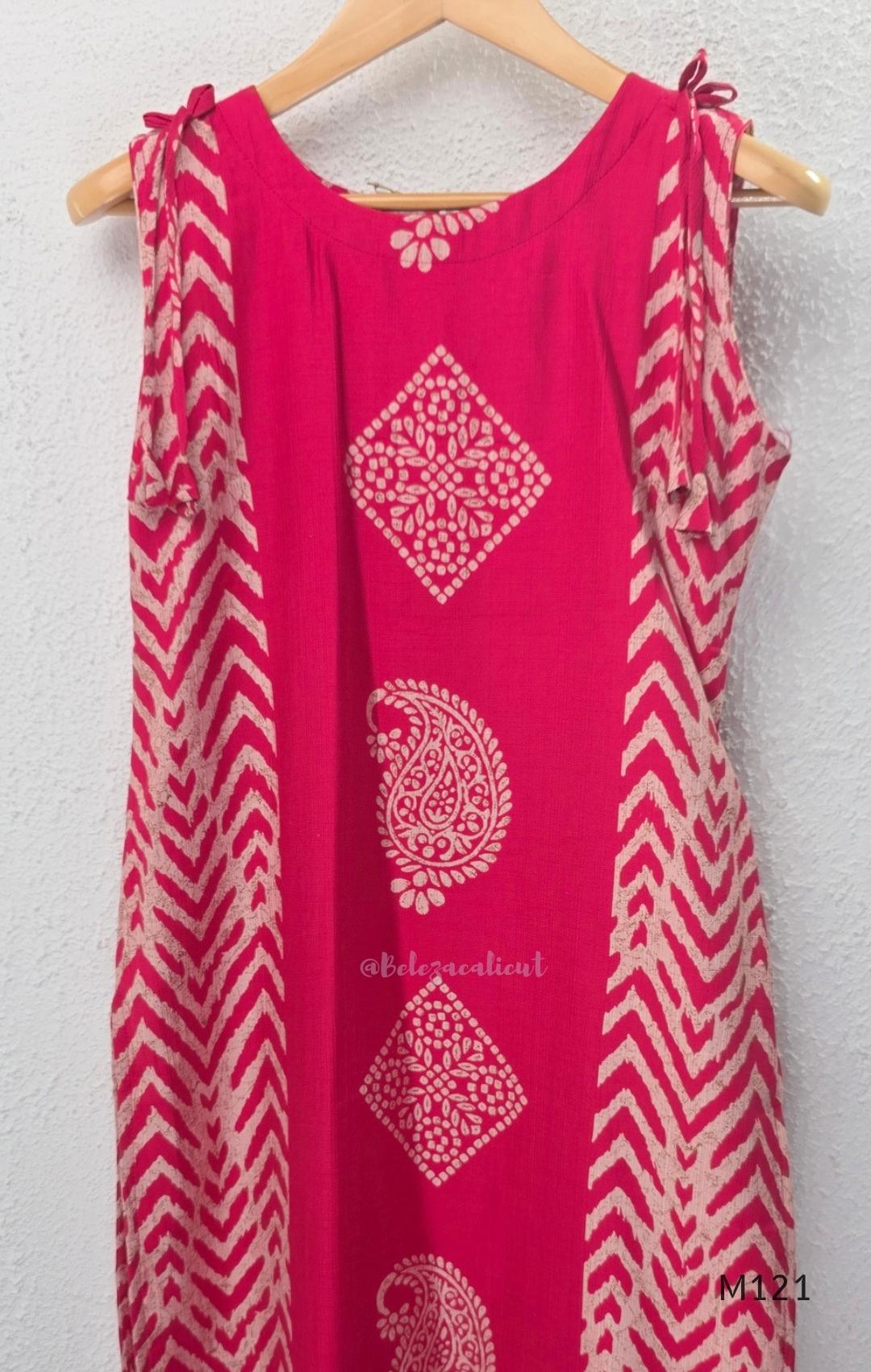 Rani pink Vertigan silk two-piece co-ord set with beige central motifs, chevron side panels and matching straight pants.