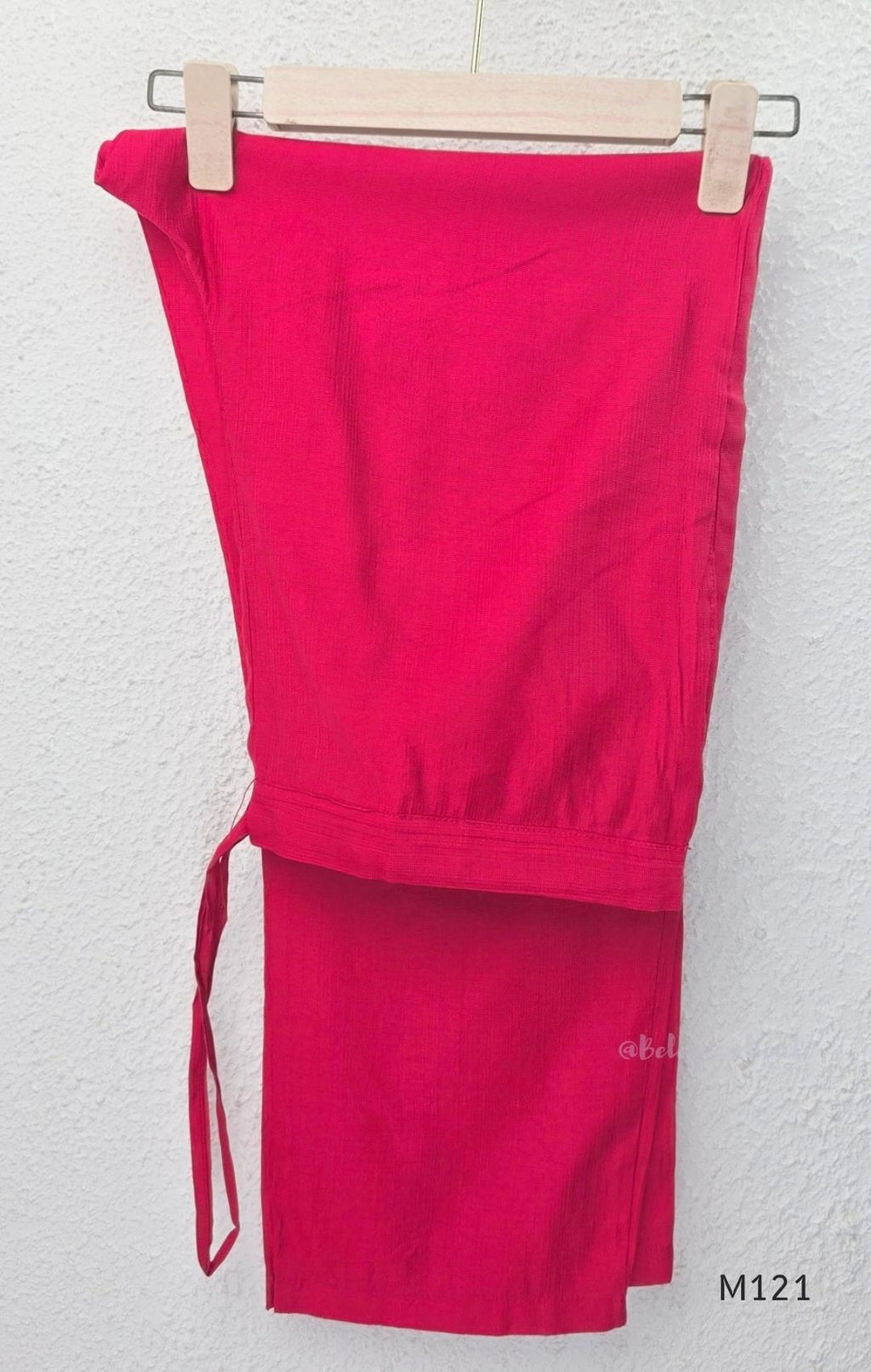 Rani pink Vertigan silk two-piece co-ord set with beige central motifs, chevron side panels and matching straight pants.