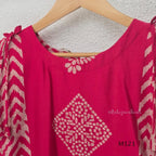 Rani pink Vertigan silk two-piece co-ord set with beige central motifs, chevron side panels and matching straight pants.