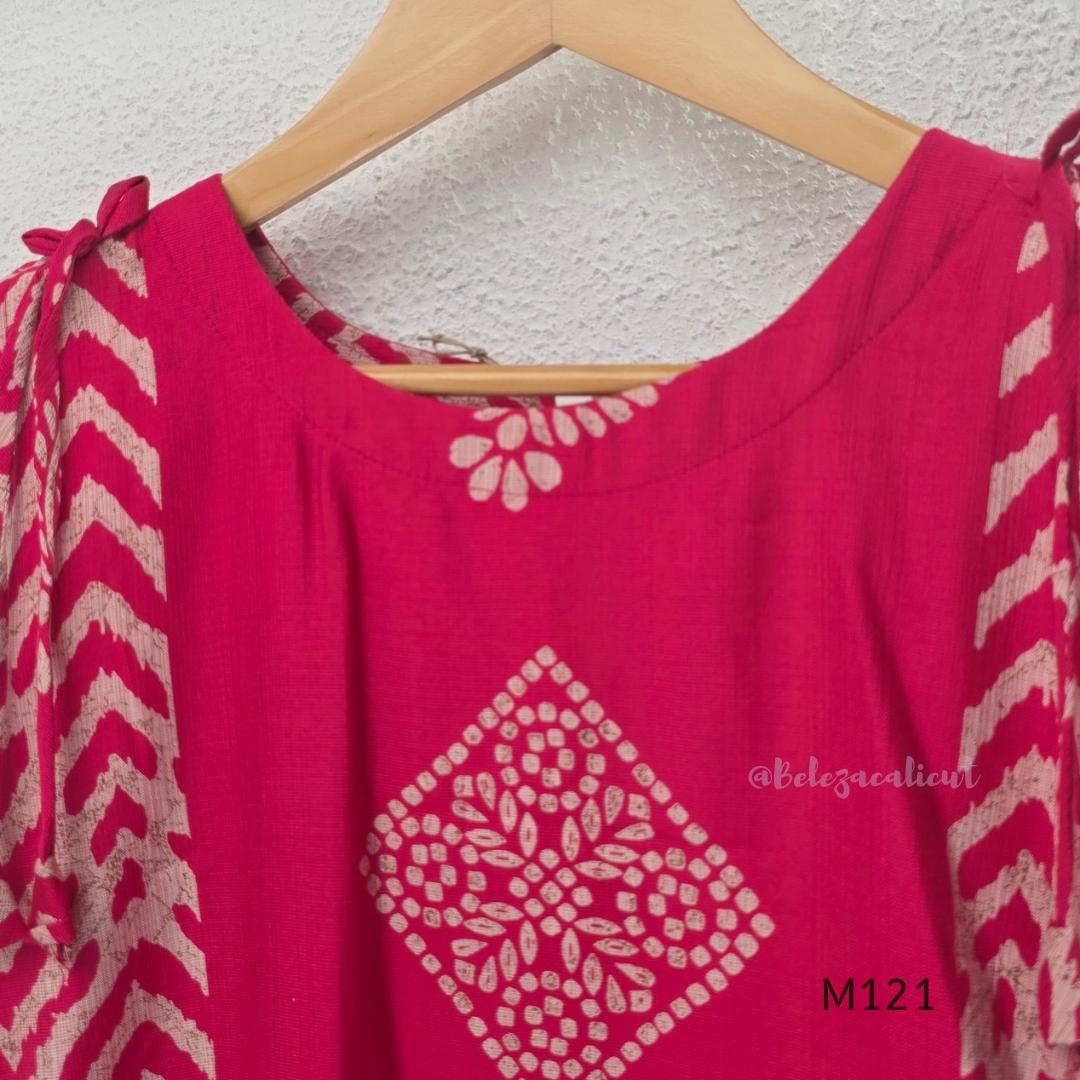 Rani pink Vertigan silk two-piece co-ord set with beige central motifs, chevron side panels and matching straight pants.
