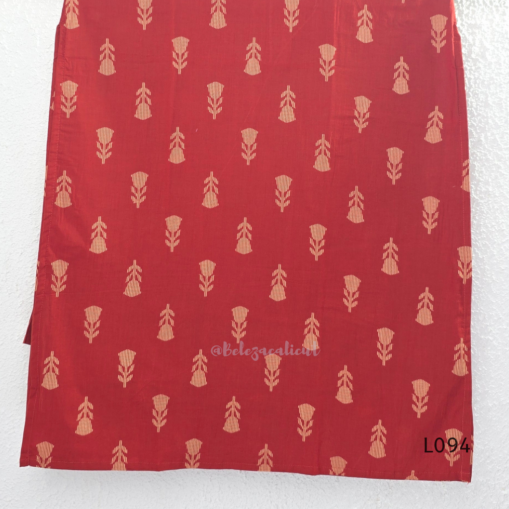 Red cotton women’s top with beige leaf print, small notch neckline, elbow sleeves, and straight everyday fit.