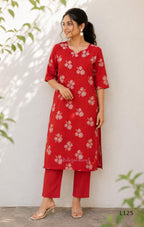 Red mul chanderi coord set with white botanical print top and matching plain straight pants.