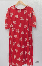 Red mul chanderi coord set with white botanical print top and matching plain straight pants.