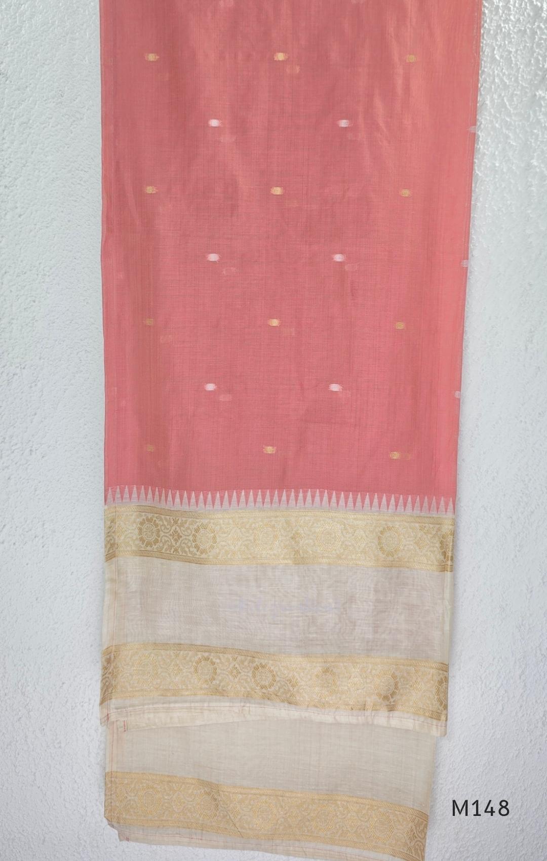 Rose pink and ivory tissue blend churidar set with woven gold borders, scattered motifs, straight bottom and matching dupatta.