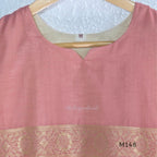 Rose pink and ivory tissue blend churidar set with woven gold borders, scattered motifs, straight bottom and matching dupatta.