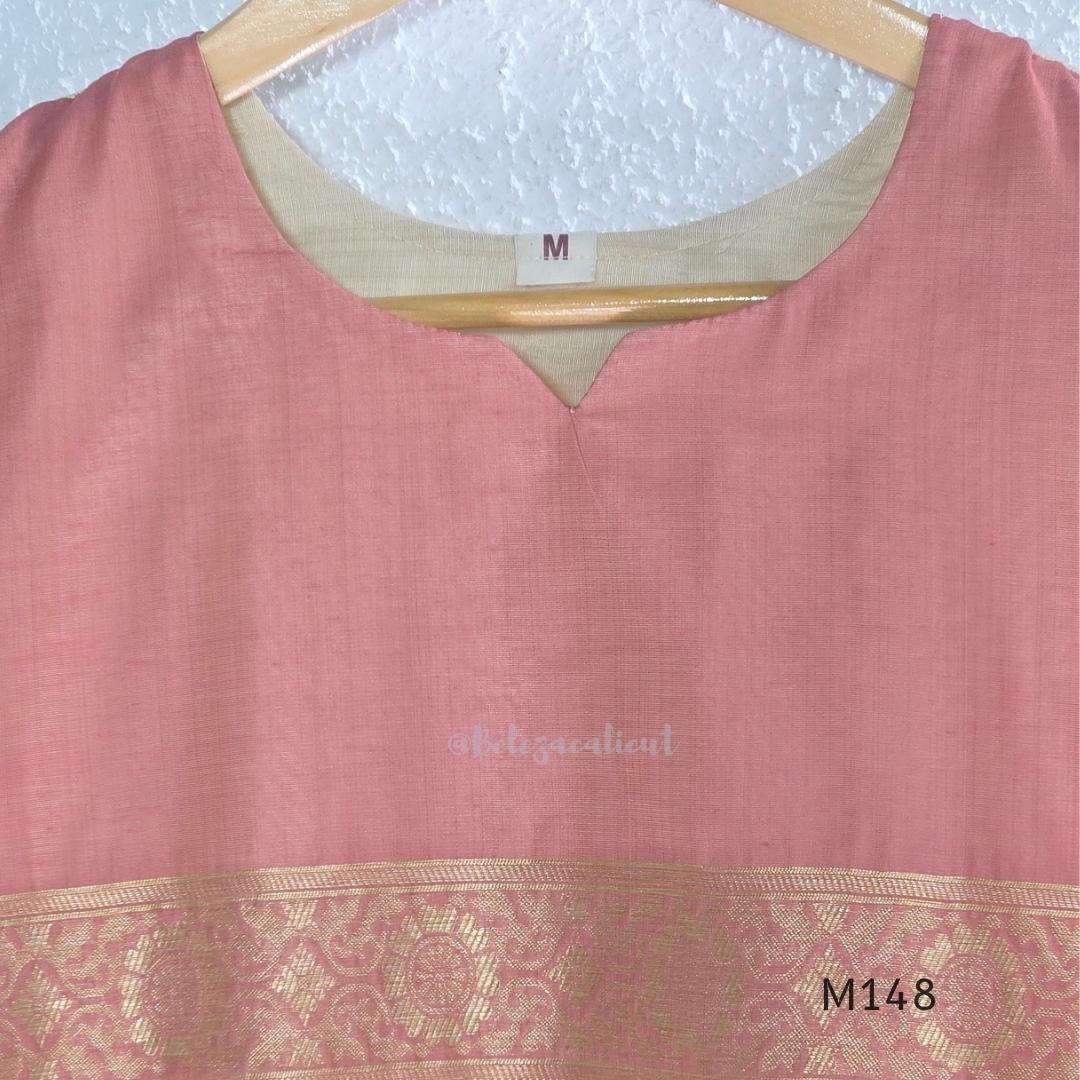 Rose pink and ivory tissue blend churidar set with woven gold borders, scattered motifs, straight bottom and matching dupatta.