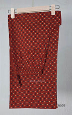 Warm rust cotton top and bottom set with cream, deep blue and black geometric print and relaxed wide-fit pants at Beleza, Mankavu, Calicut.