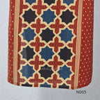 Warm rust cotton top and bottom set with cream, deep blue and black geometric print and relaxed wide-fit pants at Beleza, Mankavu, Calicut.