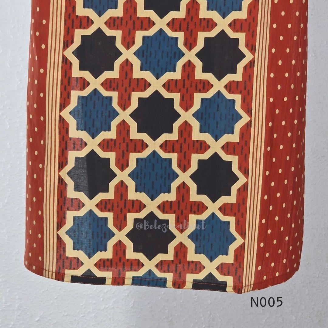 Warm rust cotton top and bottom set with cream, deep blue and black geometric print and relaxed wide-fit pants at Beleza, Mankavu, Calicut.