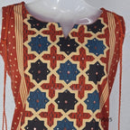 Warm rust cotton top and bottom set with cream, deep blue and black geometric print and relaxed wide-fit pants at Beleza, Mankavu, Calicut.