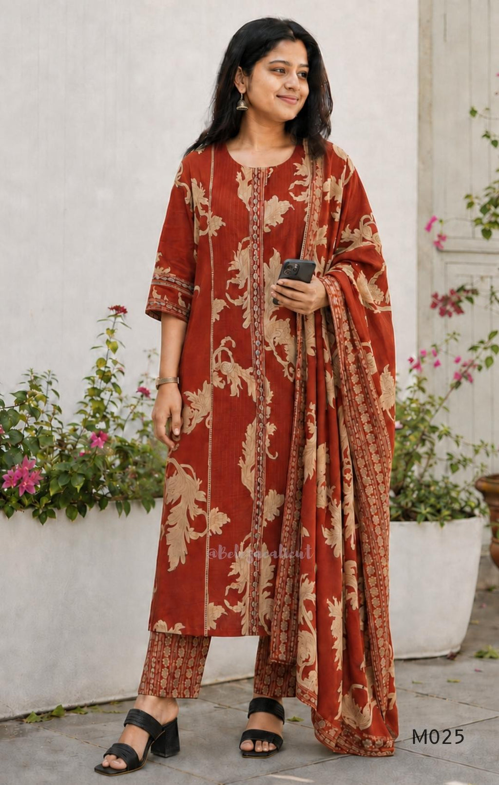 Rust cotton 3-piece ethnic set with beige leaf print, matching dupatta and printed pant. Comfortable ethnic wear for women in Calicut.