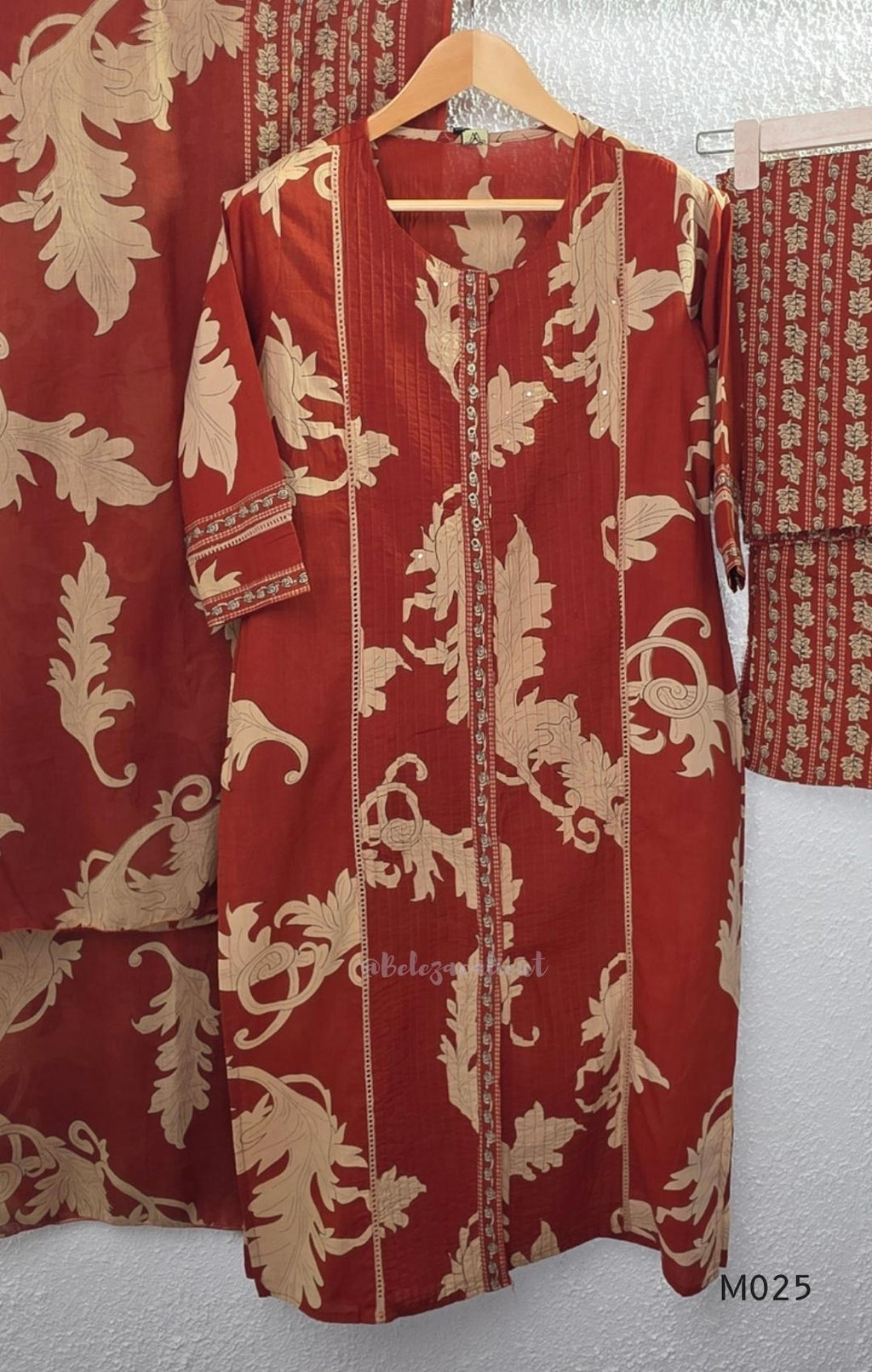 Rust cotton 3-piece ethnic set with beige leaf print, matching dupatta and printed pant. Comfortable ethnic wear for women in Calicut.
