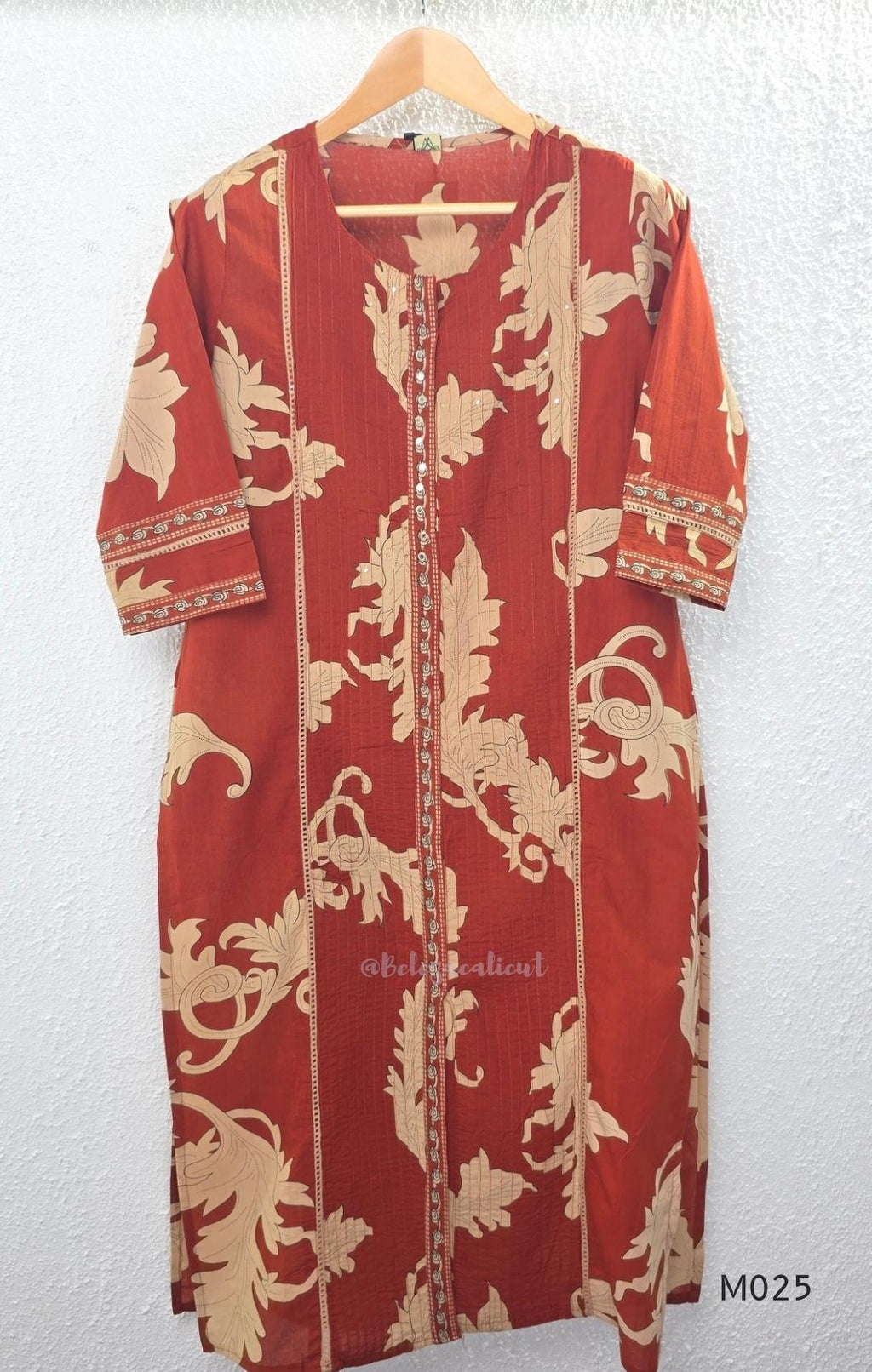 Rust cotton 3-piece ethnic set with beige leaf print, matching dupatta and printed pant. Comfortable ethnic wear for women in Calicut.